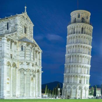 front of cathedral and falling tower in twilight light in Pisa in Italy